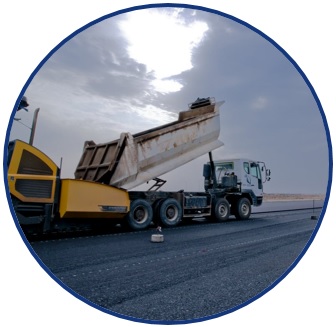 Picture of a white truck dumping paving material in a yellow paver: a scene of an asphalt paving operation. The picture is a logo symbolizing the research theme of: “Preserving Existing Transportation Systems”.